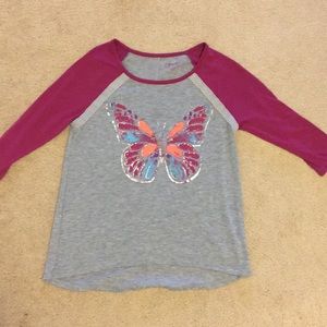 Quarter sleeve length T-shirt with butterfly image